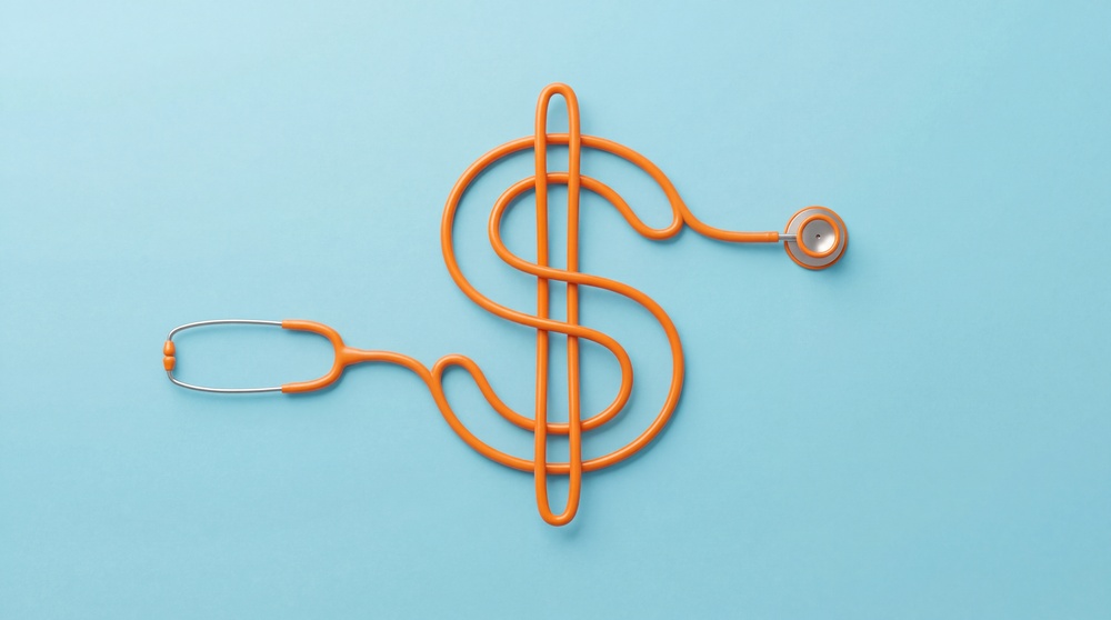 An orange stethoscope twisted in the shape of a dollar sign.